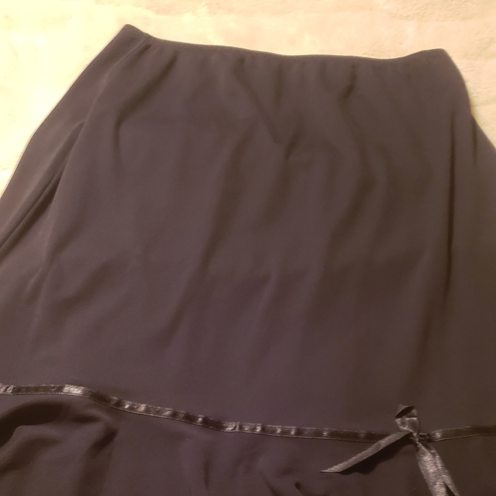 Sexy black skirt with bow. size 14/16